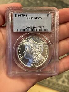 New Listing1880/79 s morgan silver dollar PCGS MS65