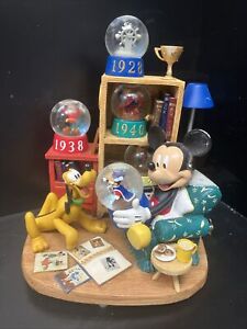 New ListingMickey Mouse and Pluto thru the years 5 mini Globes snow globe/Music box