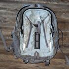 The North Face Surge light blue and grey hiking backpack