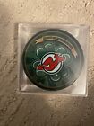 NJ Devils St. Patrick's Day Puck [Green] - Limited Edition
