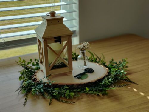 Custom rustic wedding centerpieces - fairy lights, candle, foliage