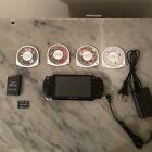 Sony PSP 2000 Console Piano Black + 4 Games + 2GB Memory + Charger + Battery