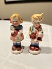 Vintage boy and girl salt and pepper shakers.