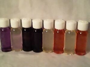 -Wholesale (14) 2 oz bottles of top selling perfumes and 144 empty bottles & top