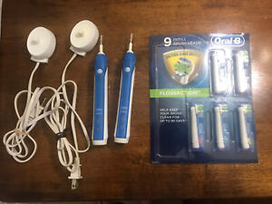 2 BRAUN Oral-B Advanced Clean Rechargeable Electric Toothbrush 5 New Heads