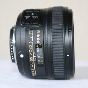 Nikon AF-S 50mm f/1.8G + HB-47 Lens Hood & Caps, a UV Filter – Excellent Cond.