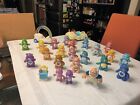 22 -Care Bears posable lot with Cloud Keeper & Vehicles