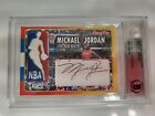 Michael Jordan signed game worn logoman patch card 1/1
