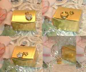 LOT of FOUR ~ ESTEE LAUDER CHARM s ~  Giftbox ~ Star ~ Heart ~ Ring ~ Goldtone