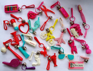 A Vintage Assortment of 1980s BELL Plastic Charms and More