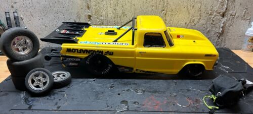 Losi 22s no prep drag car roller with parts and upgrades.