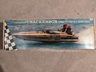 DPi Crackerbox remote control boat with charger, batteries and remote control