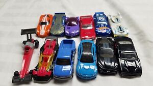 Lot of 12 Hot Wheels cars random dates 1999-2014 by Mattel