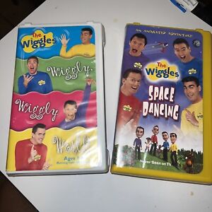 The Wiggles VHS Lot Of 2 Tapes:  Space Dancing  Never On Tv & Wiggly World
