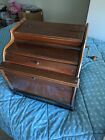 Vintage Mandolina paper roller organ; with four music rolls; needs new bellows