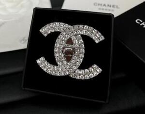 Chanel Interlocking CC Platinum Plated Turnlock CZ Brooch (CCXX039)