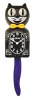 Black Kit-Cat Klock  Yellow Bow  Purple Tale Clock (15.5″ high)