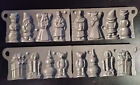John Wright 2 x cast iron candy molds Christmas themes USA 1996 preowned GREAT