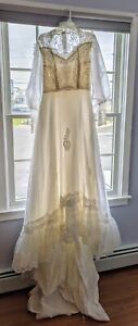 Vintage 1970's high necked lace wedding dress with train