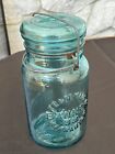 Antique Banner WM Warranted Glass Blue Jar with Glass Lid Wire Bail Closure
