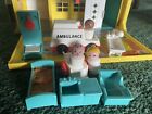 Vintage Fisher Price Hospital with Pictured Accessories. Works.