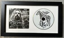 ROB ZOMBIE SIGNED CD COVER. CD SIGNED BY SHERI MOON & TOMMY CLUFETOS.