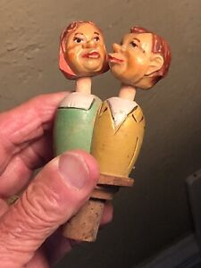 Vintage ANRI Wood Carved Mechanical MAN & Woman “KISSING” Bottle Stopper