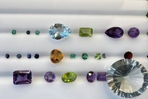 Lot of Natural Stones- 19.87 Carats- some chipped.