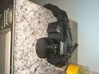 Canon T50 SLR 35mm Camera w/ Canon FD 50mm 1:1.8 Lens and bag with flim 