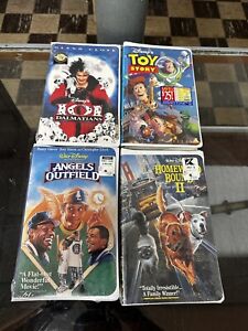 lot of 4 sealed disney movies vhs tapes