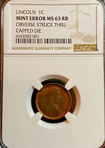 LINCOLN CENT (1C) OBVERSE STRUCK THRU CAPPED DIE-NGC MS 63 RB - RARE MINT ERROR