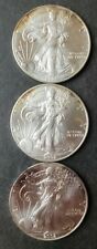 2001, 2002, and 2002 $1 American Silver Eagle Dollars