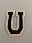 Letter U in Black on White Iron On applique 250340