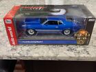 Auto World American Muscle 1973 Ford Mustang Mach 1 Blue Glow 1/18 AMM1323