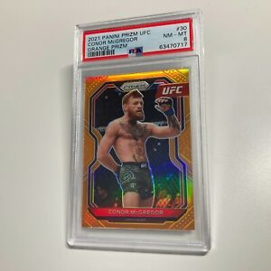 Conor McGregor 2021 Panini Prizm UFC Orange Refractor Card 27/99 #30 PSA 8