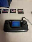 sega game gear games lot,powers on DOSENT WORK, comes with games case,wires,plug