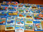 HUGE LOT 35 VEHICLES HOT WHEELS 26 PACKAGES LONG HAULERS PAVEMENT POUNDERS 30TH