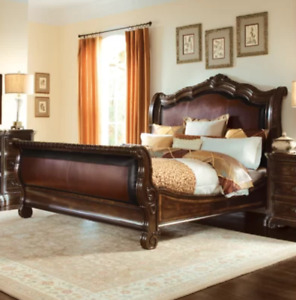 LUXURY WOOD/LEATHER VALENCIA king size SLEIGH BED In a very good condition.