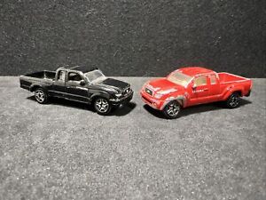 MotorMax Toyota Tacoma Lot Of 2. Black And Red