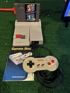 Original Nintendo NES-101 Video Game Top Loader Console With Game + bone TESTED