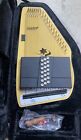 Oscar Schmidt AutoHarp 0S-45CE with finger picks and tunning tool.