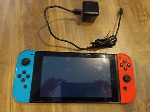 Nintendo Switch 32GB Handheld Console - Neon Red/Neon Blue - Used scratched
