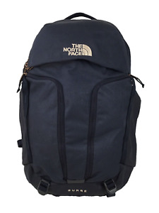 The North Face Surge Unisex 31L Navy Laptop Backpack Rose Gold Zipper Pulls