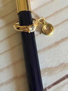 Estee Lauder Gold Tone Charm - With This Ring...