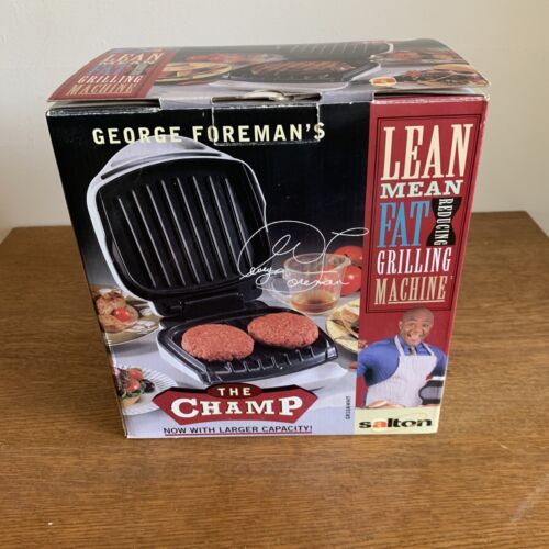 GEORGE FOREMAN GRILLING MACHINE, MODEL LEAN MEAN FAT REDUCING MACHINE! White
