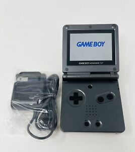 New ListingNintendo GameBoy Advance, GBA SP AGS-101 Graphite System -- with a charger  Good