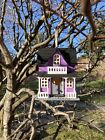Purple decorative wooden hand painted bird house