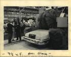 1990 Press Photo Ryko Auto Detailer in action at New Orleans Car Wash Convention