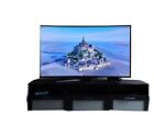 Samsung 65' Curved 4K UHD TV + TV Stand + Apple TV