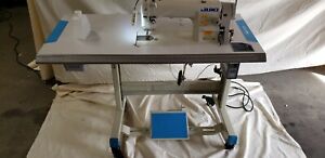 Juki DDL-8700 SEWING MACHINE WITH T-LEGS STAND ,CASTERS,SERVO MOTOR LED LAMP